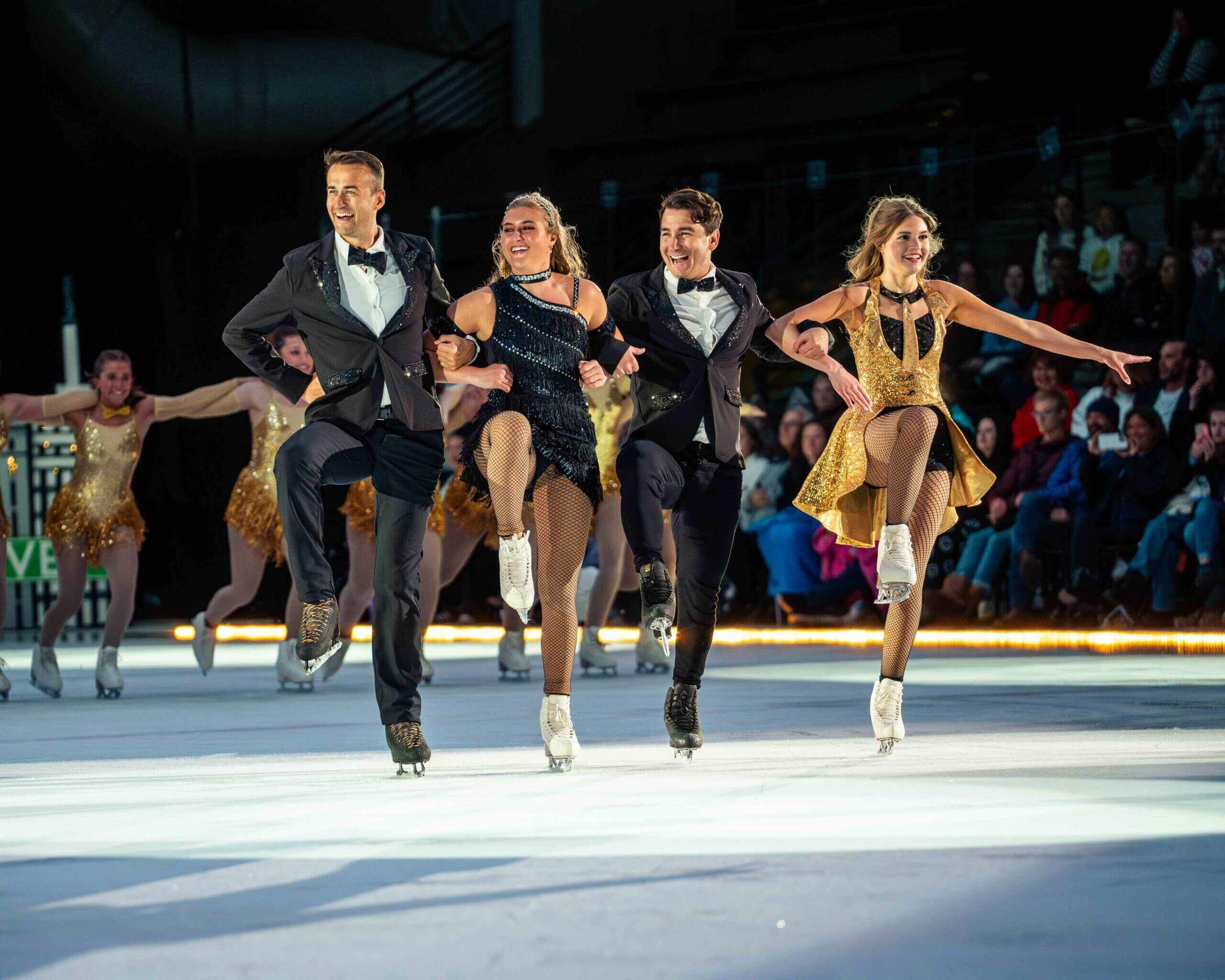 Ice skaters performing in synchronized routine.